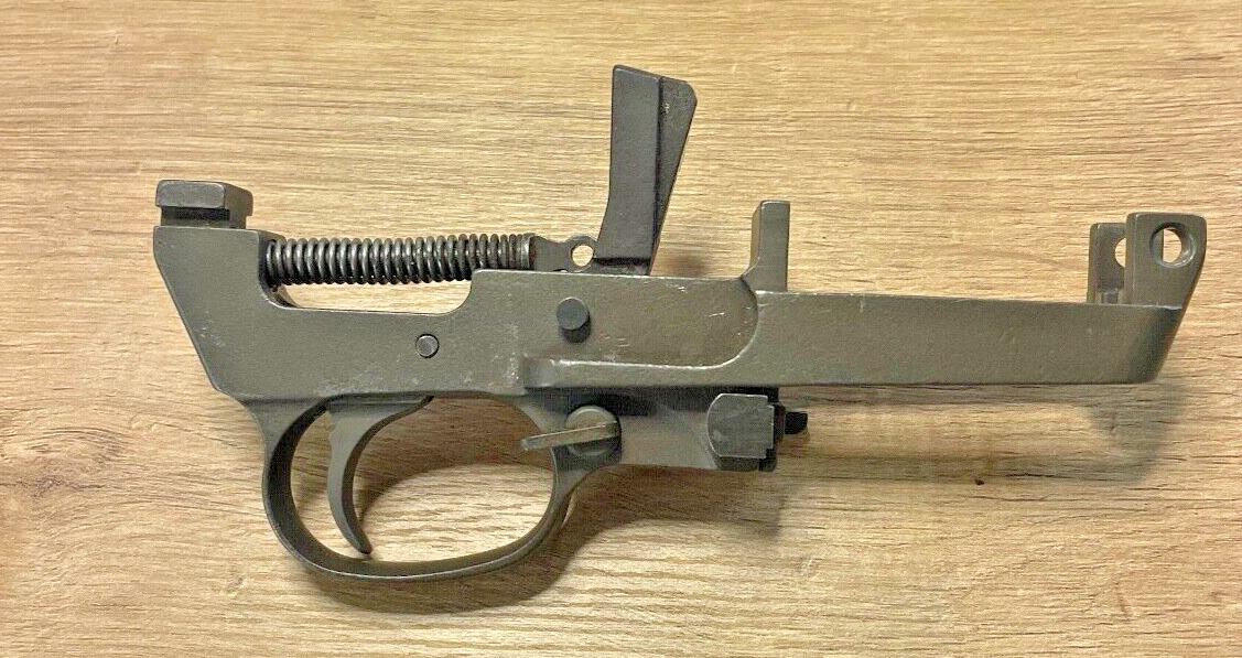 M1 Carbine Trigger Housing Type VI M2 USGI complete with mixed parts.