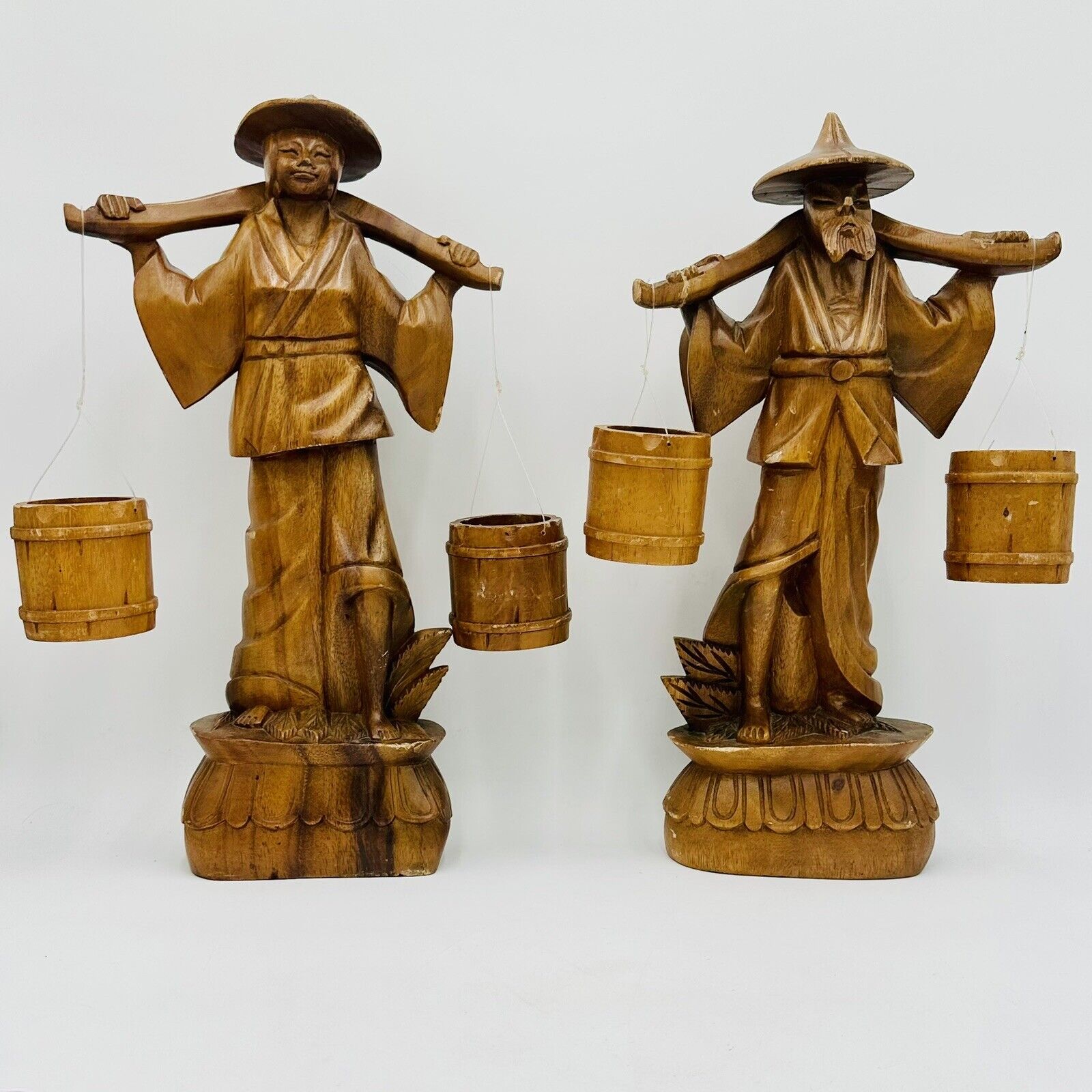 RARE PAIR OF TEAK WOOD ASIAN WATER CARRIERS, 21 TALL, HANDCARVED FROM THAILAND
