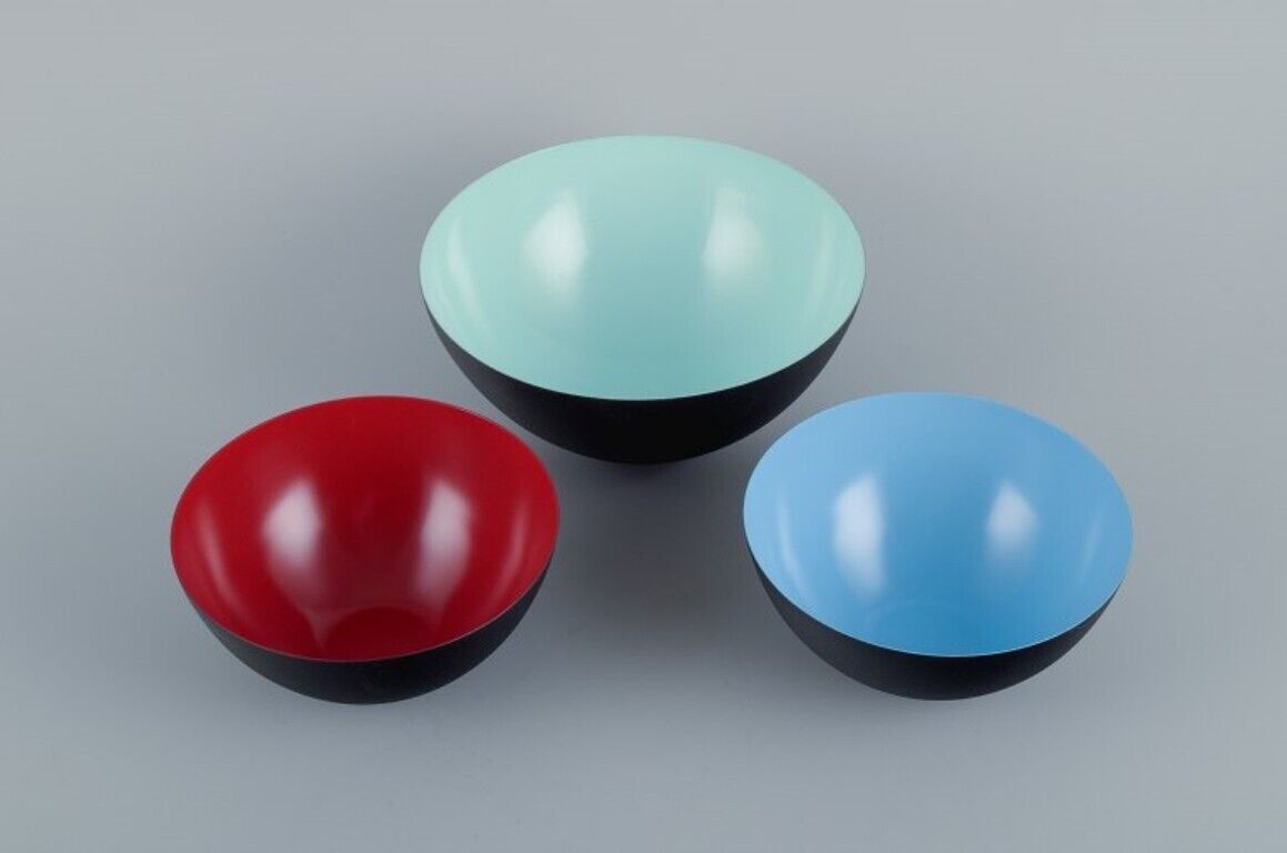 Three Krenit bowls in metal. Blue, red, mint green. Design by Hermann Krenchel