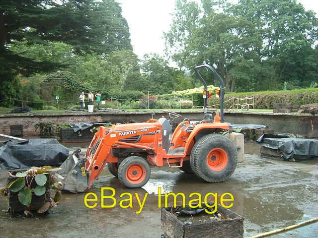 Photo 6x4 Tractor in a pond A Kubota La402st compact tractor was used to  c2004