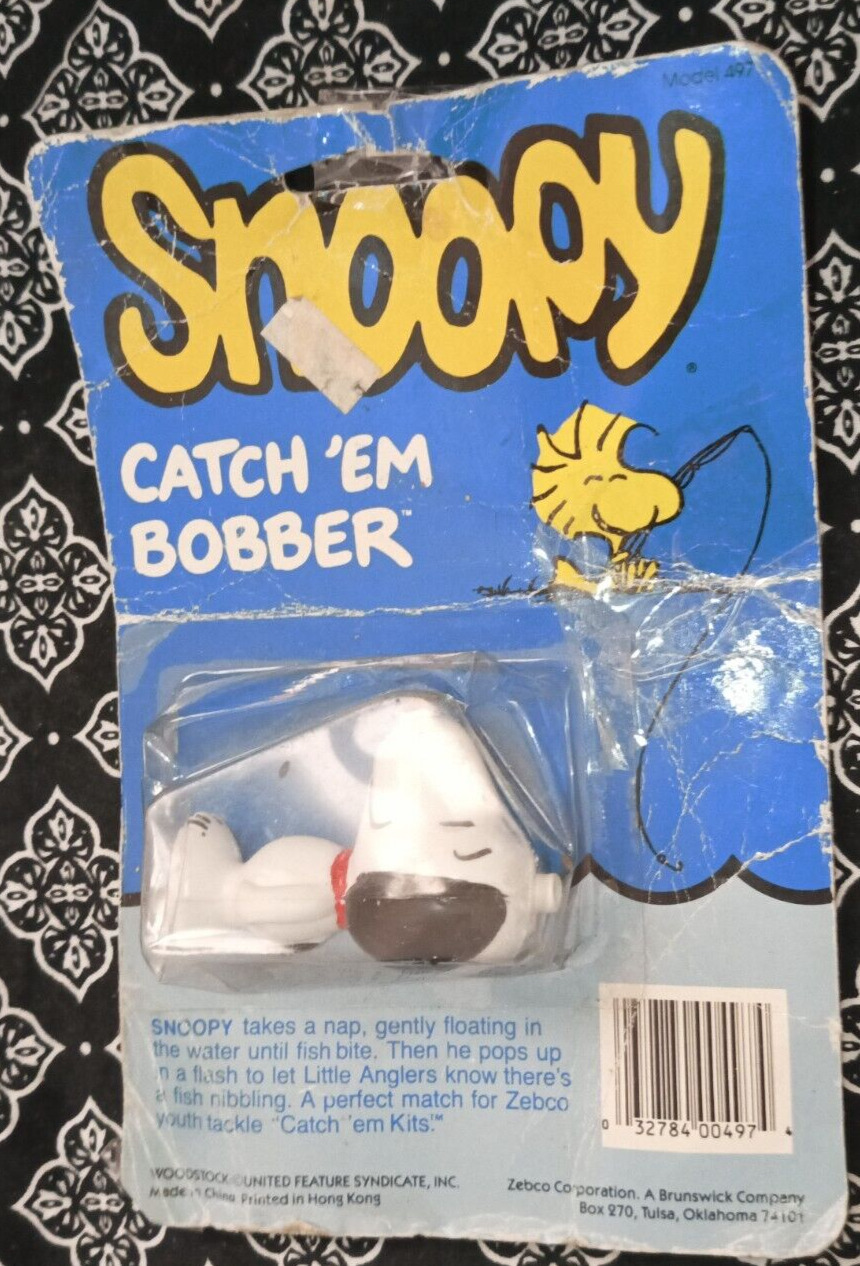 Vintage Peanuts Snoopy Catch\' EM Bobber Zebco Model 497