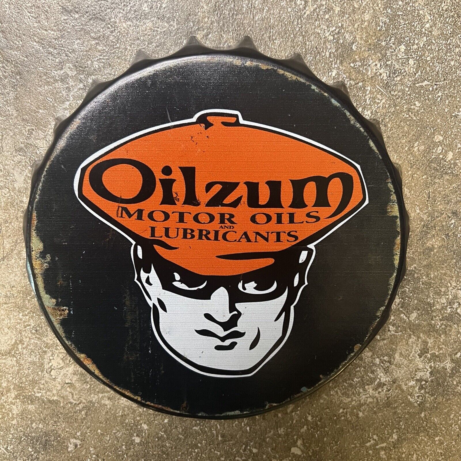 VINTAGE Oilzum Motor Oil Porcelain Metal Sign Black Orange Bottle Cap 7”x1” RARE