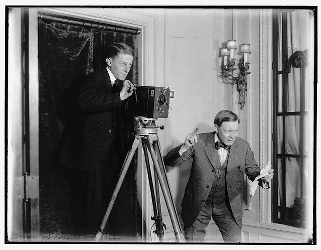 Two men using movie camera indoors,photography,Detroit Publishing Company,1908