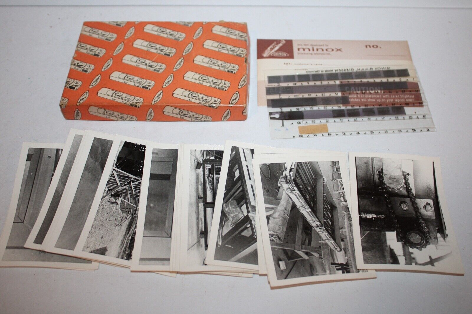 Vintage Minox Film Box with Minox B&W photos and negatives Orange Box