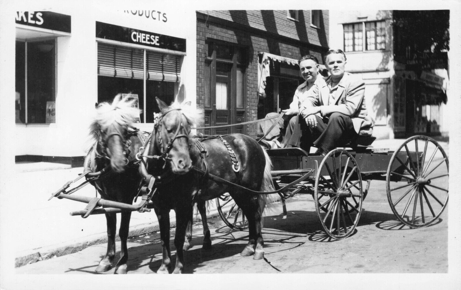 RPPC Two Men in Buggy Drawn by 2 Ponies Cheese Store Real Photo Postcard c 1930s