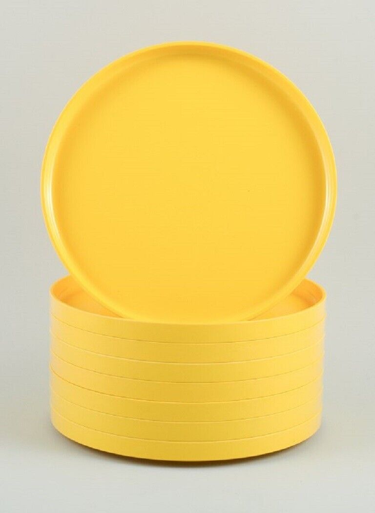 Massimo Vignelli for Heller, Italy. A set of 8 dinner plates in yellow melamine.