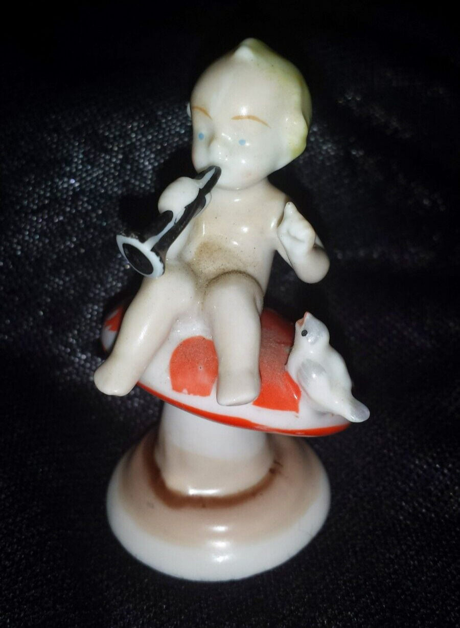 Vintage Metzler &Ortloff Porcelain Kewpie Figurine Playing Clarinet On Mushroom