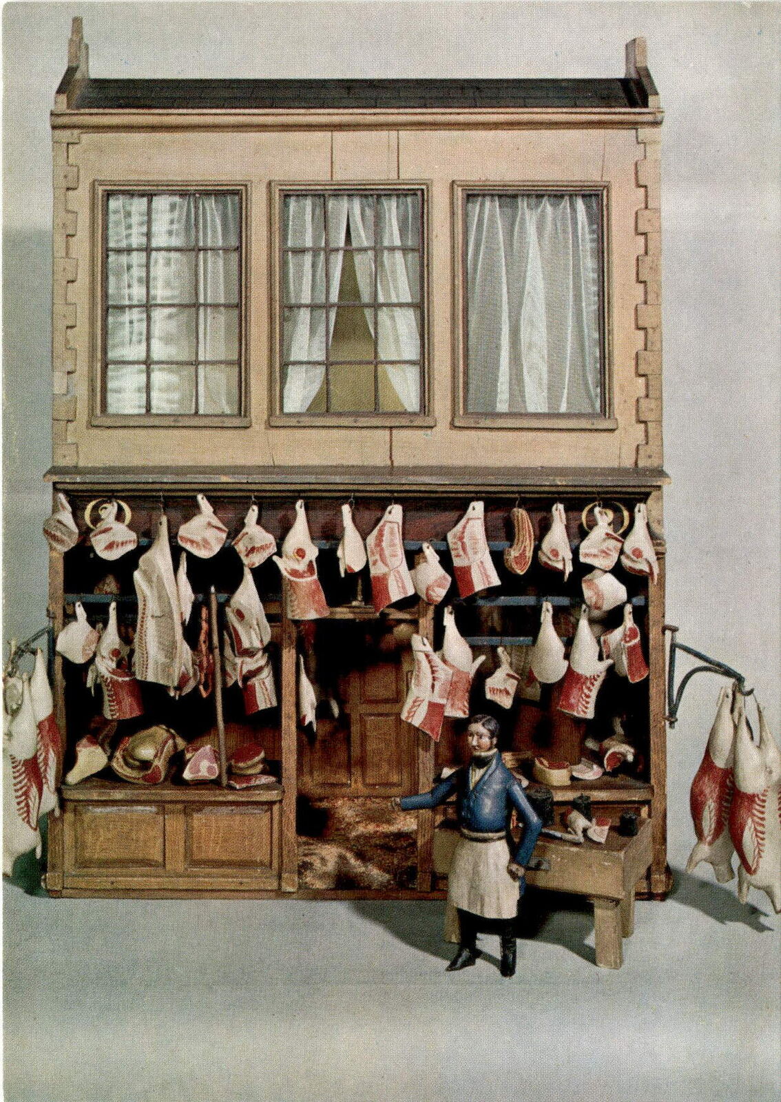 Antique English butcher\'s shop model from 1840.