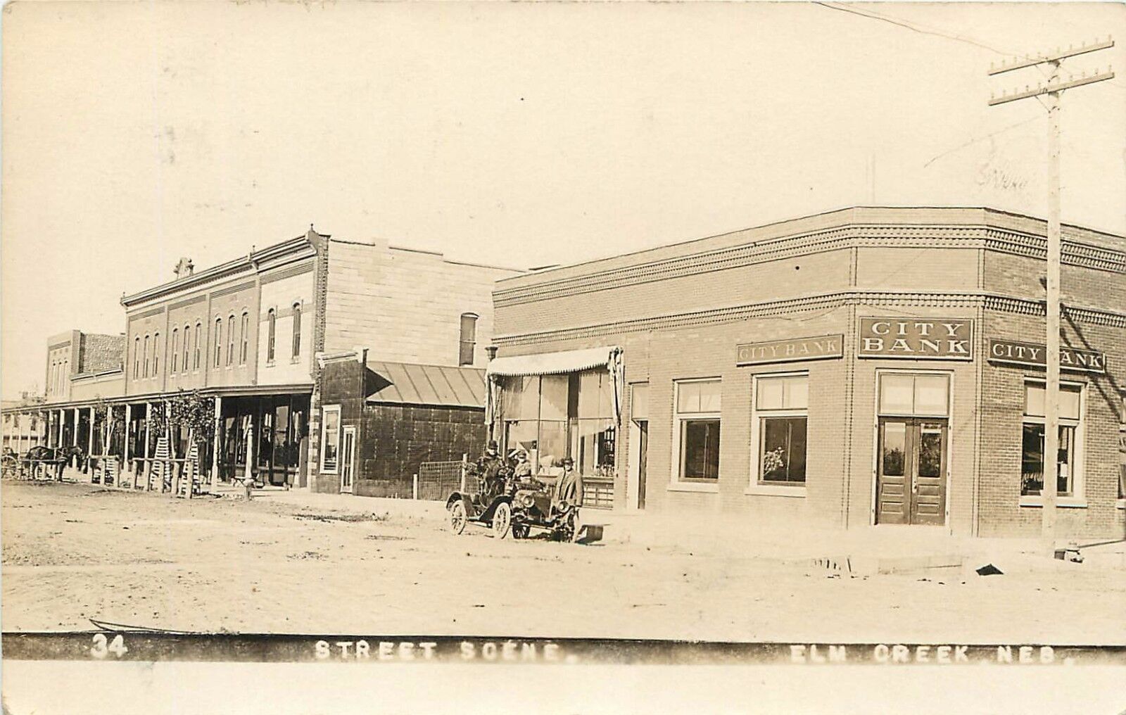 c1910 RPPC Postcard 34 Street Scene & City Bank, Elm Creek NE Buffalo County