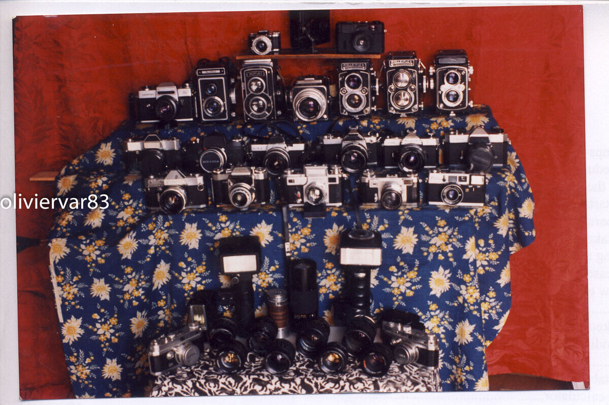 Vintage 1980s photo - large display of Rollei, Leica and other cameras