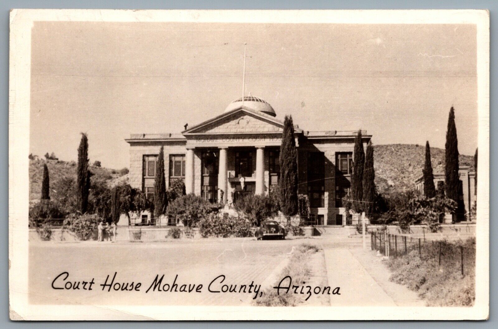 Postcard RPPC c1930s Kingman AZ Mohave County Court House Old Car