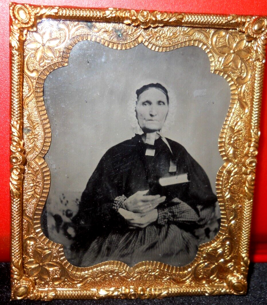 1/6th size Tintype of older lady in brass mat/frame