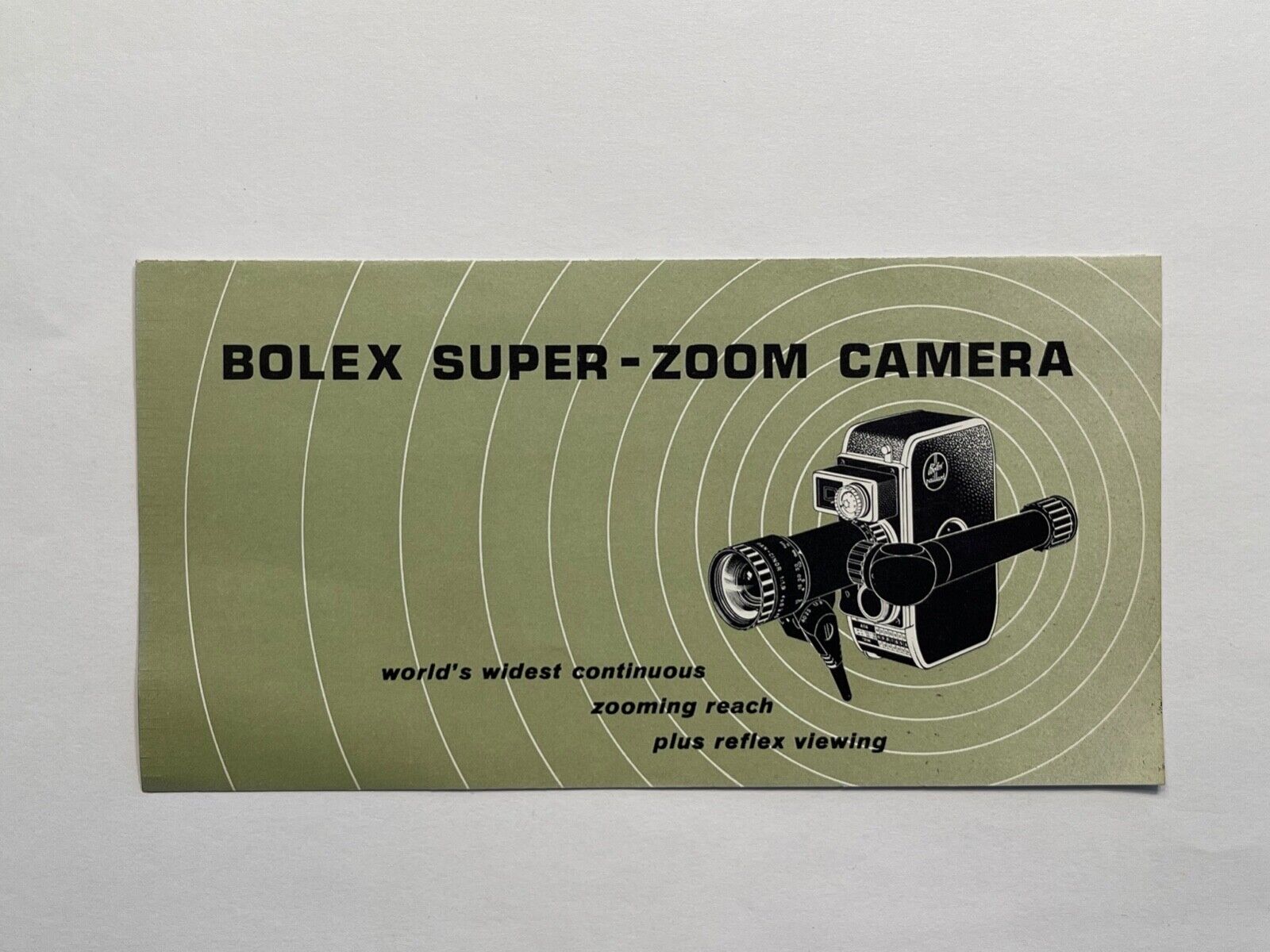 1960 Bolex Super Zoom Movie Camera - Sales Brochure Print Advertisement