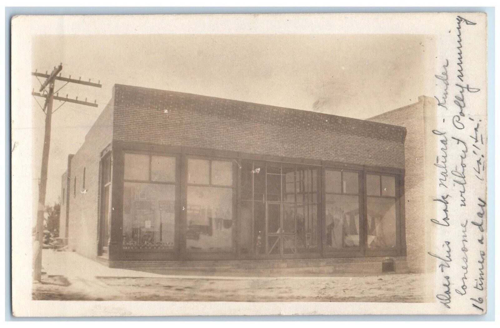 Belpre Kansas KS RPPC Photo Postcard Store Display Scene Street Dirt Road 1909