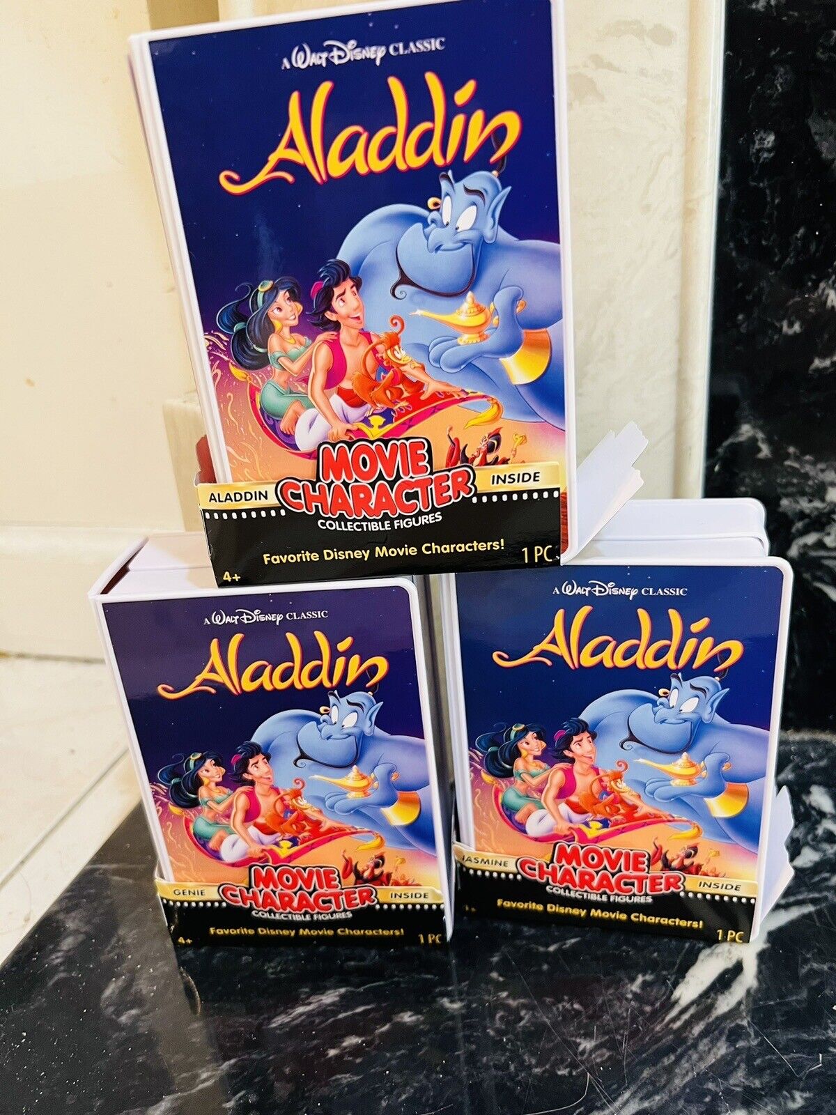 Disney’s  100th Anniversary “3” VHS Boxes / Figures From Aladdin