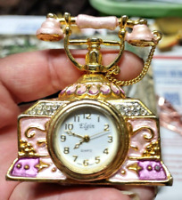 Miniature ornate pink princess phone clock picture