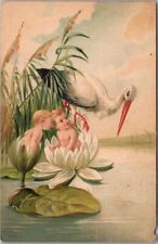 1909 Birth Announcement Embossed Postcard STORK & Babies in Lily Pond / Lotus picture