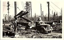 1930s OREGON LOG TRUCK LOADING LOGS FOR THE SAWMILL PHOTO RPPC POSTCARD 41-48 picture