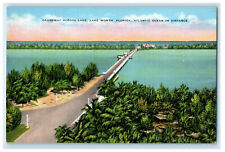 c1940s Causeway Across Lake, Atlantic Ocean in Distance Lake Worth FL Postcard picture