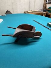 Small Wooden Decorative Hand Made Wheelbarrow Old. picture