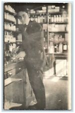 c1910s Pharmacist Making Medicine In Pharmacy Interior Store RPPC Photo Postcard picture