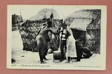 Vintage postcard 1920s AFRICA. Pileuses de mil devant leurs cases picture