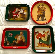Multiple 1980's Era Coca-Cola Santa Claus trays in good shape picture