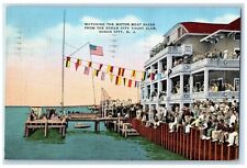 1941 Watching Motor Boat Races Ocean City Yacht Club New Jersey Vintage Postcard picture