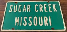 Vintage Sugar Creek Missouri Booster License Plate Embossed Steel picture