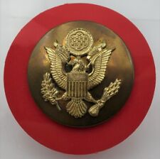 E22, Signal Corps NCO Cap Badge with orange cast plastic backer disc picture