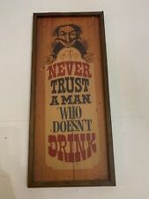Vintage 1972 John T. Nosler Never Trust A Man Who Doesn't Drink Bar Sign picture