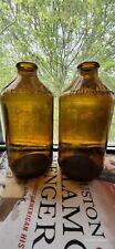 2 Antique 1950s Embossed Amber Beer Bottles picture