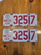 1914 Michigan Porcelain License Plates PAIR 32517 Enamel State Seal White & Red picture