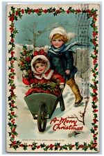 1912 Christmas Children Pulling Cart Winter Berries Tuck's Laminated Postcard picture