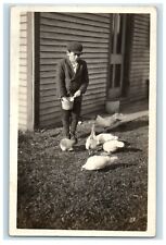 c1910's Boy Feeding Chicken Rooster Hen RPPC Photo Unposted Antique Postcard picture