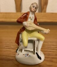 VINTAGE VICTORIAN PORCELAIN COLONIAL GENTLEMAN PLAYING INSTRUMENT 2.5 In picture