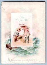 1890's CHRISTMAS CHILDREN AT SEASHORE BEACH HAGELBERG BERLIN GERMANY CARD picture
