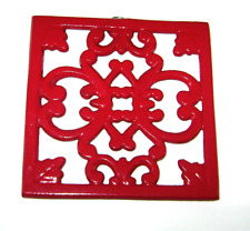 Red Cast Iron Decorative Trivet picture
