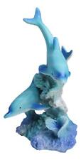 Marine Life Ocean Two Blue Dolphins Swimming Around Coral Reef Statue Sea World picture