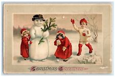 1912 Christmas Greetings Snowman Children Snowball Fighting Embossed Postcard picture