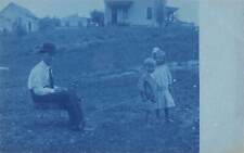 J72/ Interesting RPPC Postcard c1910 Blue Tint Kids Pulling Dad in Wagon 440 picture