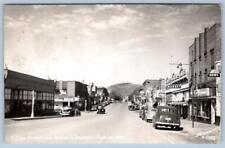 1930's-40's RPPC RAWLINS WYOMING CEDAR STREET AND BUSINESS DISTRICT POSTCARD picture