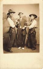 1910s Western Studio Photo Duel Cowboys Newsie? Odd Real Photo Postcard Gun rare picture