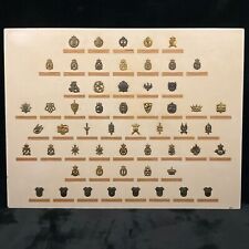 Collection of 56 Antique WWI & WWII Royal Danish Military Badges on the Board picture