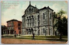 Indianapolis IN~Man Rides Past Roberts Park Church & Bertha Ballard Home~1924 PC picture