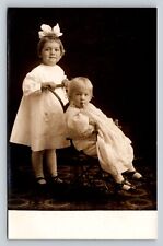 RPPC Girl Pushes Stroller w/Blonde Child with Finger in Mouth VTG Postcard 1482 picture