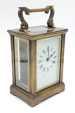 Antique Victorian brass carriage clock with glass sides and folding handle picture