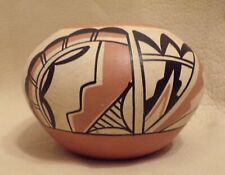 Jemez Pueblo, New Mexico pottery olla with a stylized bird design by C G picture