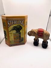 Vintage Jumbo Elephant bank on wheels + Sterling Baking Powder Tin Can picture