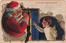 VINTAGE CHRISTMAS POSTCARD LITTLE BOY SEES SANTA CLAUS FILL STOCKING 111422 R picture